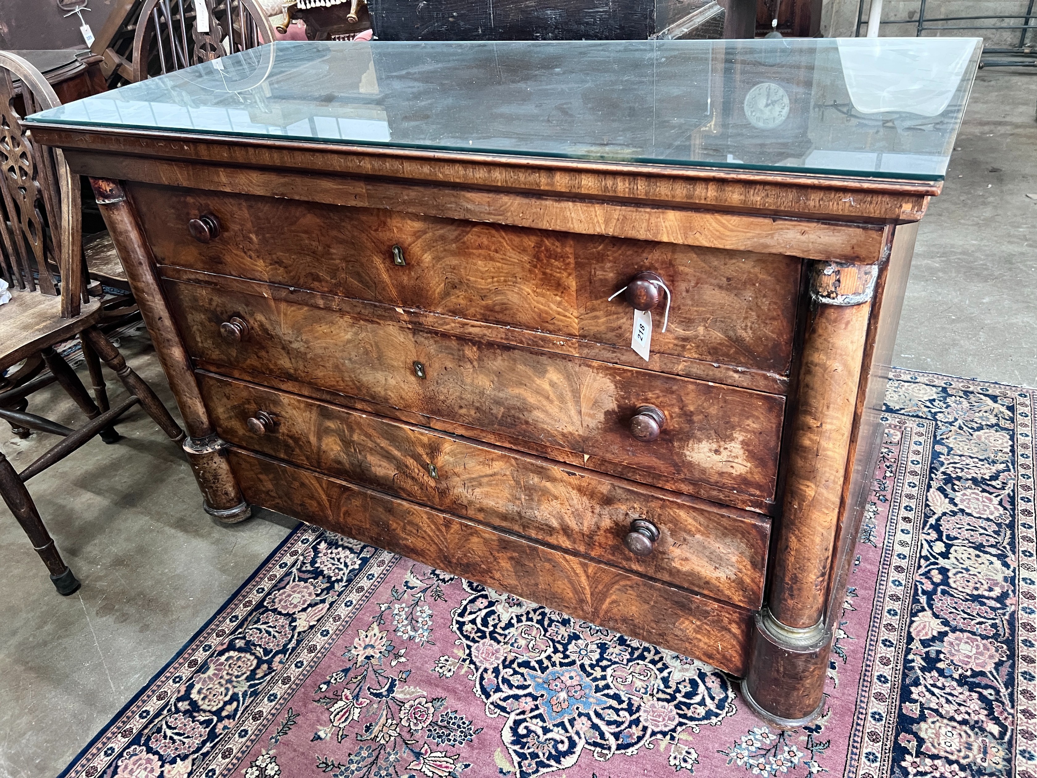 A 19th century French mahogany commode, fitted four long drawers, width 130cm, height 85cm *Please note the sale commences at 9am.